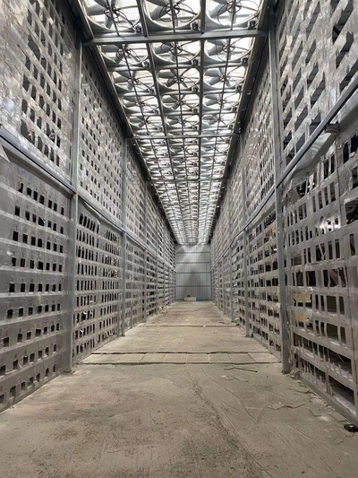 An expansive mining farm filled with rows of miners, showcasing large-scale hosted mining operations