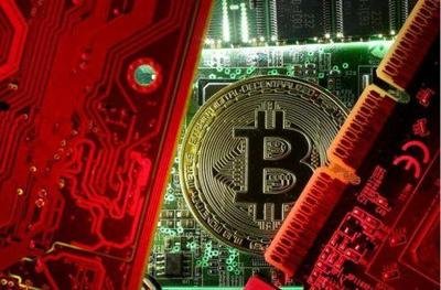 A Whatsminer M50 Bitcoin mining machine on a shelf in a mining farm.